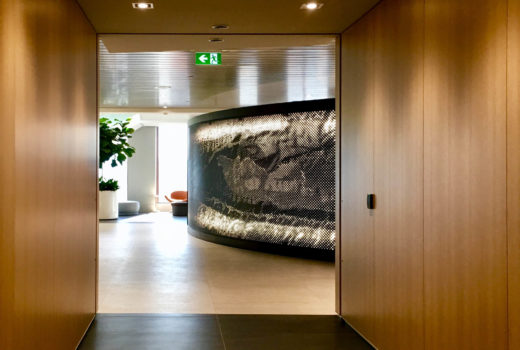 Arktura Graphic Perf backlit on a curved wall