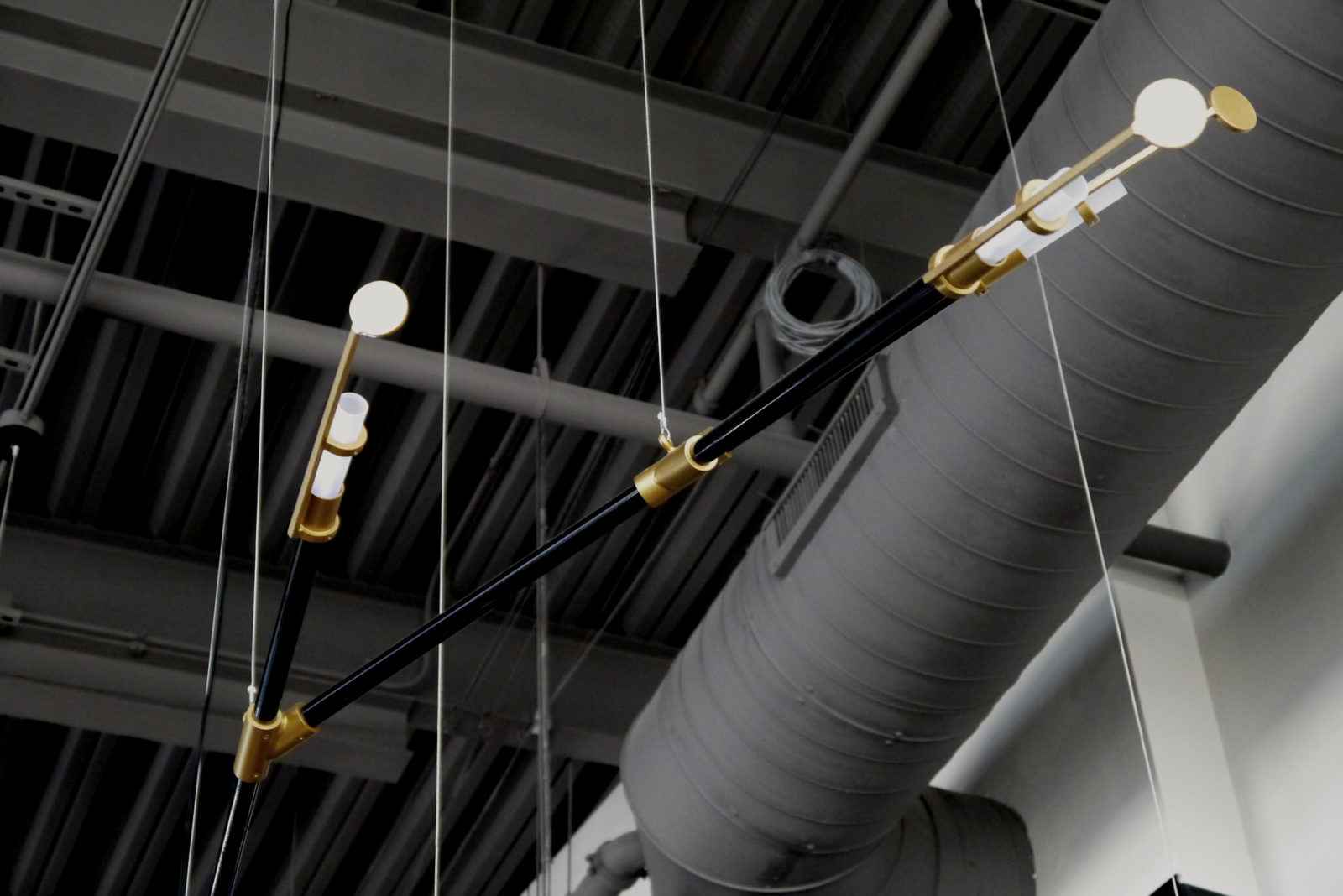 Light fixture made with steel by Arktura Solutions Studio for E+O Food and Drink
