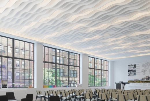This conference room features numerous chairs, large windows, a podium and Arktura baffles that mimic waves.