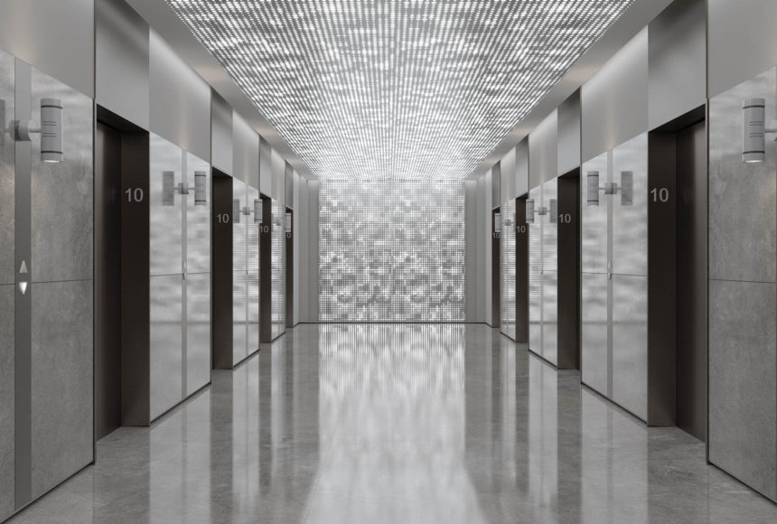 Arktura Vapor Pixel backlit ceiling panels in an elevator lobby.