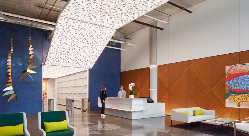 Backlit Vapor Cora across wall and ceiling.