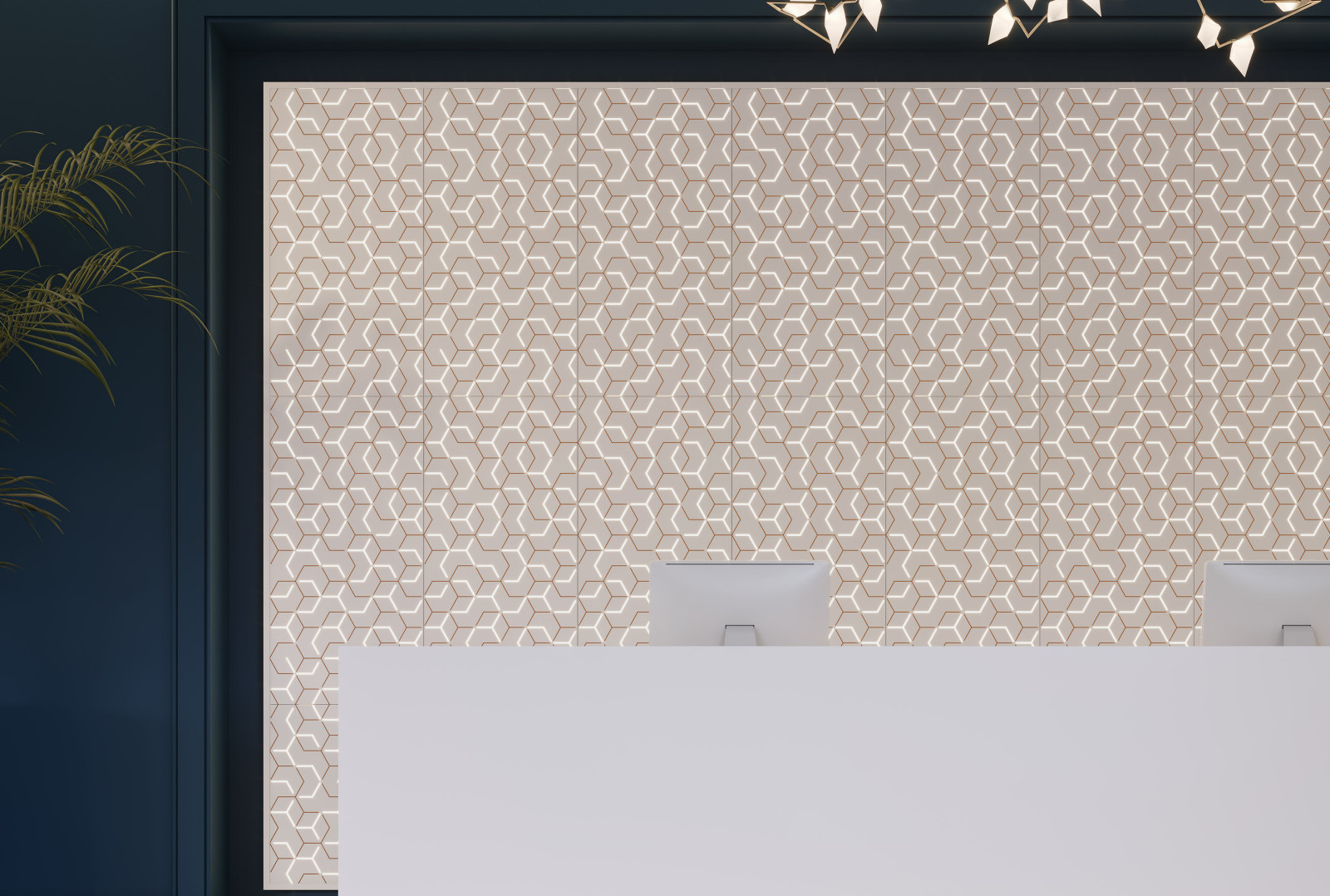 This front desk area has a white counter with two white computers. The wall behind the desk has tan VaporHue™ Link panels.