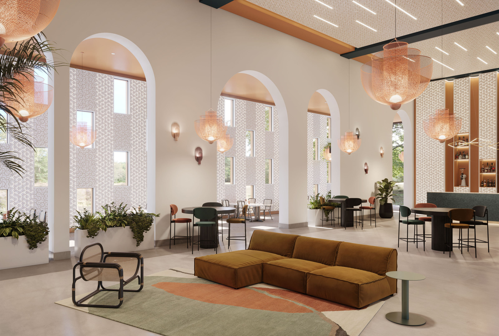 This lobby area has white walls, potted plants, a green sofa, a black chair and a multi-colored rug. There are Arktura VaporHue™ Link panels on the far wall with the windows, behind the bar, and on the ceiling integrating Arktura’s Inline Lighting.