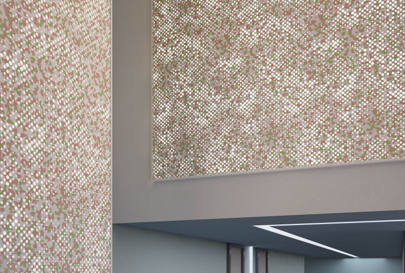 This wall has VaporHue™ Flora panels printed in green and pink tones applied on the wall, featuring Arktura Backlighting. The wall also features grey paint where the panels aren’t installed.